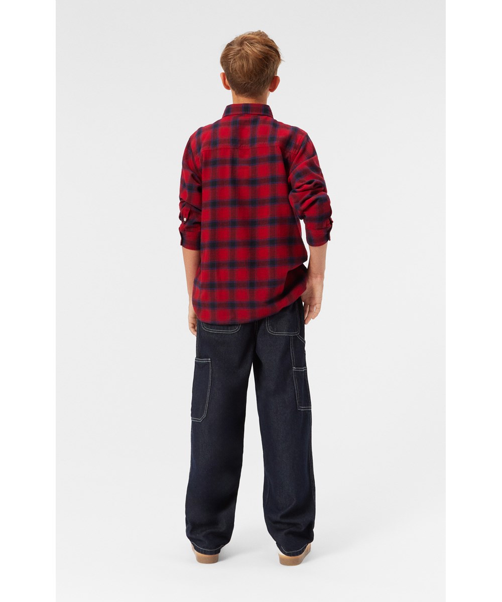 Rozzy - Dragon Check - Red, black, and blue plaid organic cotton shirt with button closure.