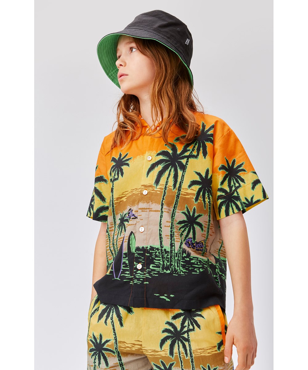Rui - Crispy Sunset - Orange Hawaii shirt with palm trees