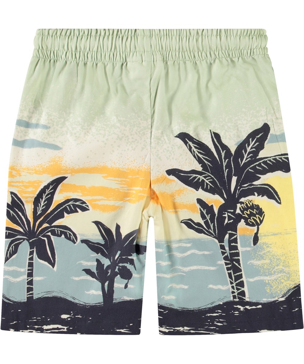 Adi - Beach Banana - Shorts in organic cotton with palm print for children.