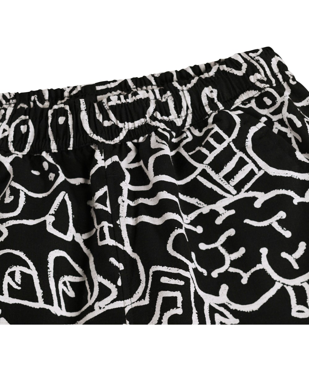 Avart - Net Doodle Dark - Black knee-length shorts for children made of organic cotton