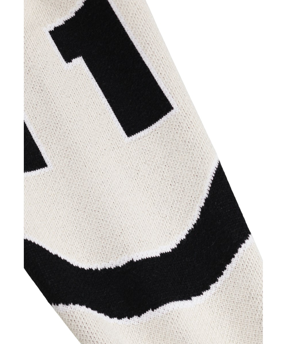 Burt - Basket Comics - Multicoloured knitted cardigan for children made of soft organic cotton 