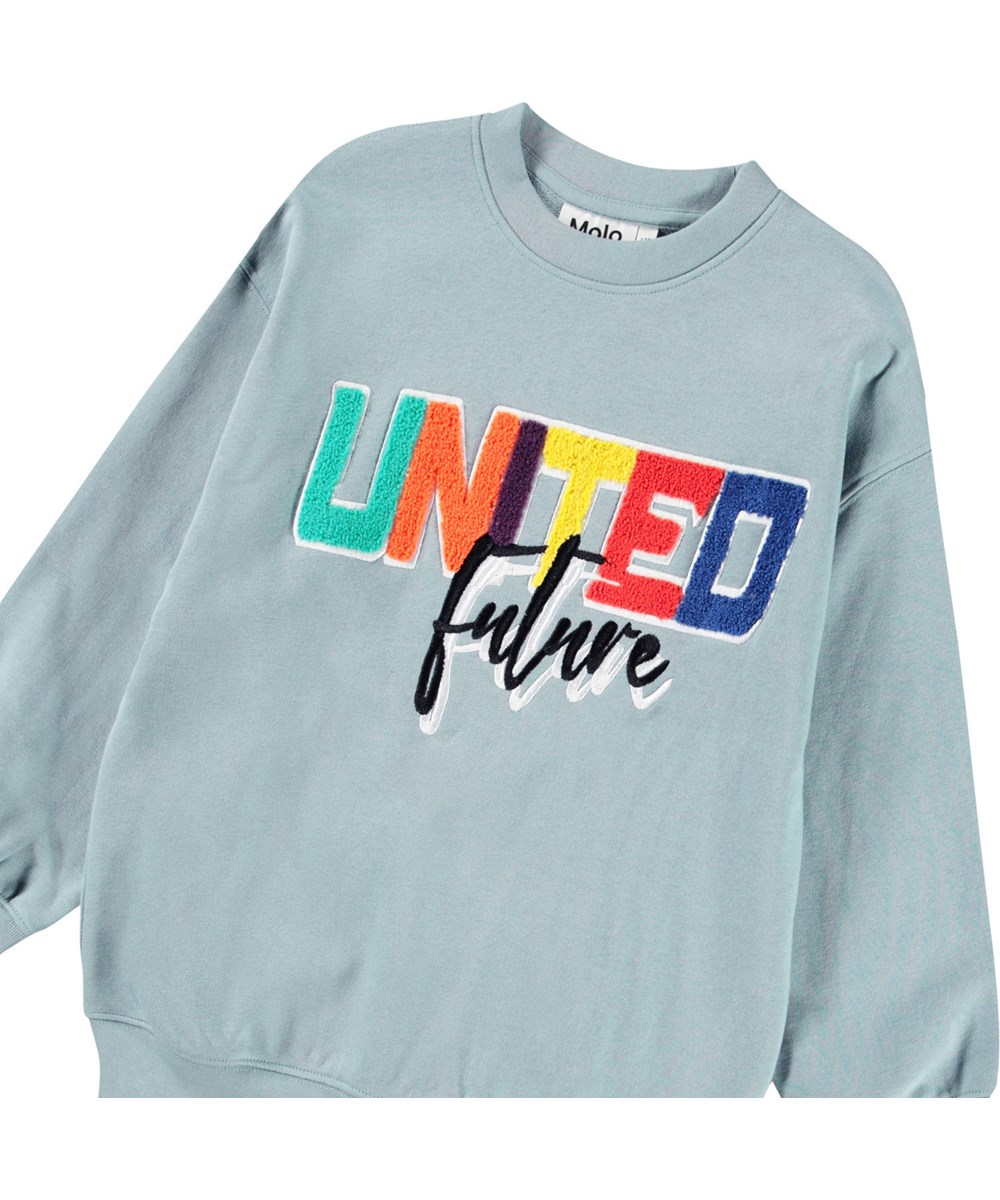 Mar - Misty Blue - Blue sweatshirt with embroidery for children in soft organic cotton with ribbed edges at the neck, sleeves, and bottom of the sweatshirt.