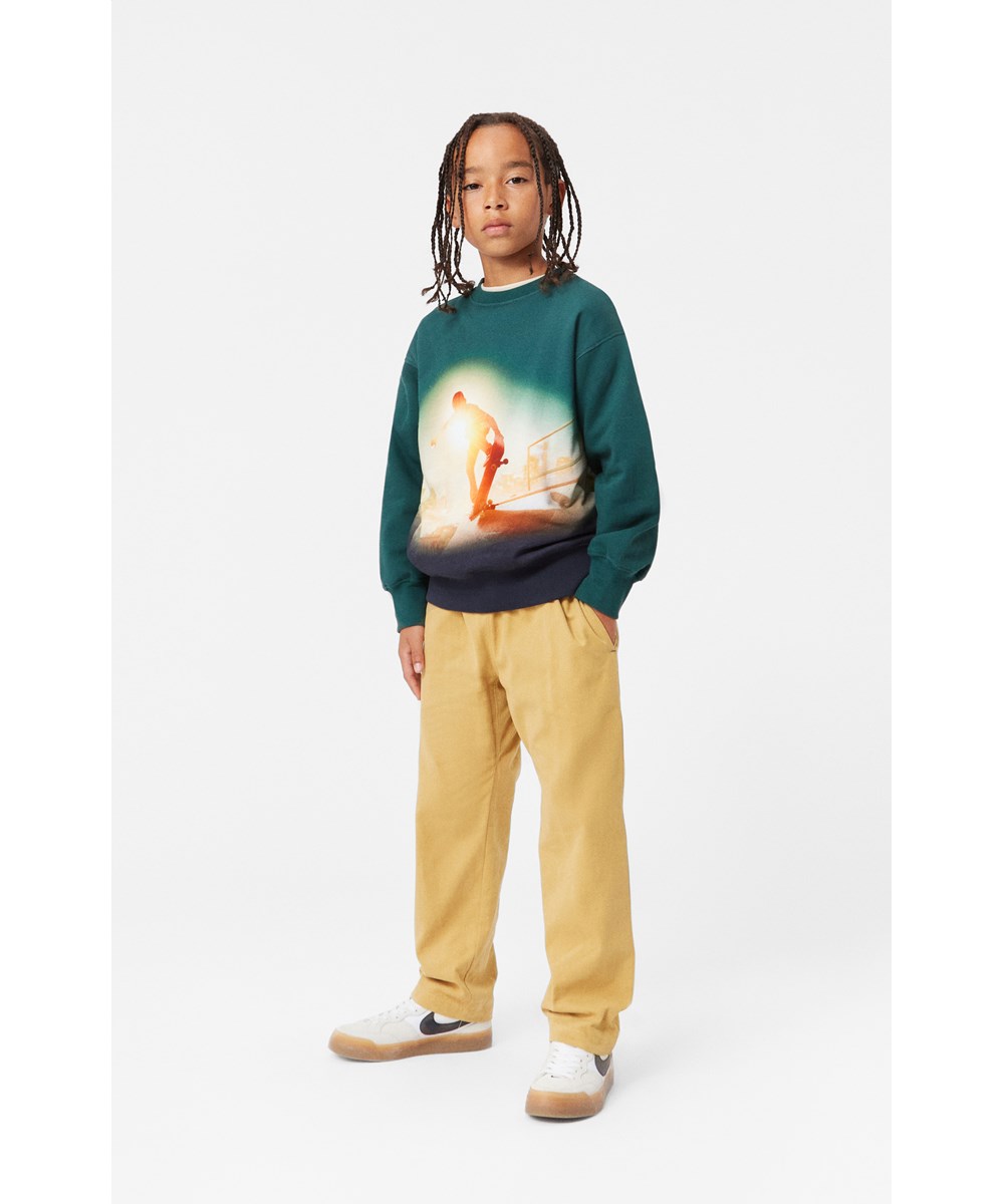 Mattis - Green Sky Skate - Green organic cotton sweatshirt with skater print.