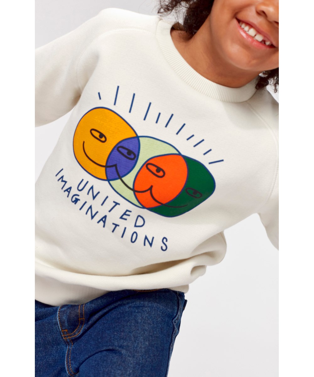 Mike - Ivory - White sweatshirt with happy faces and united imaginations print