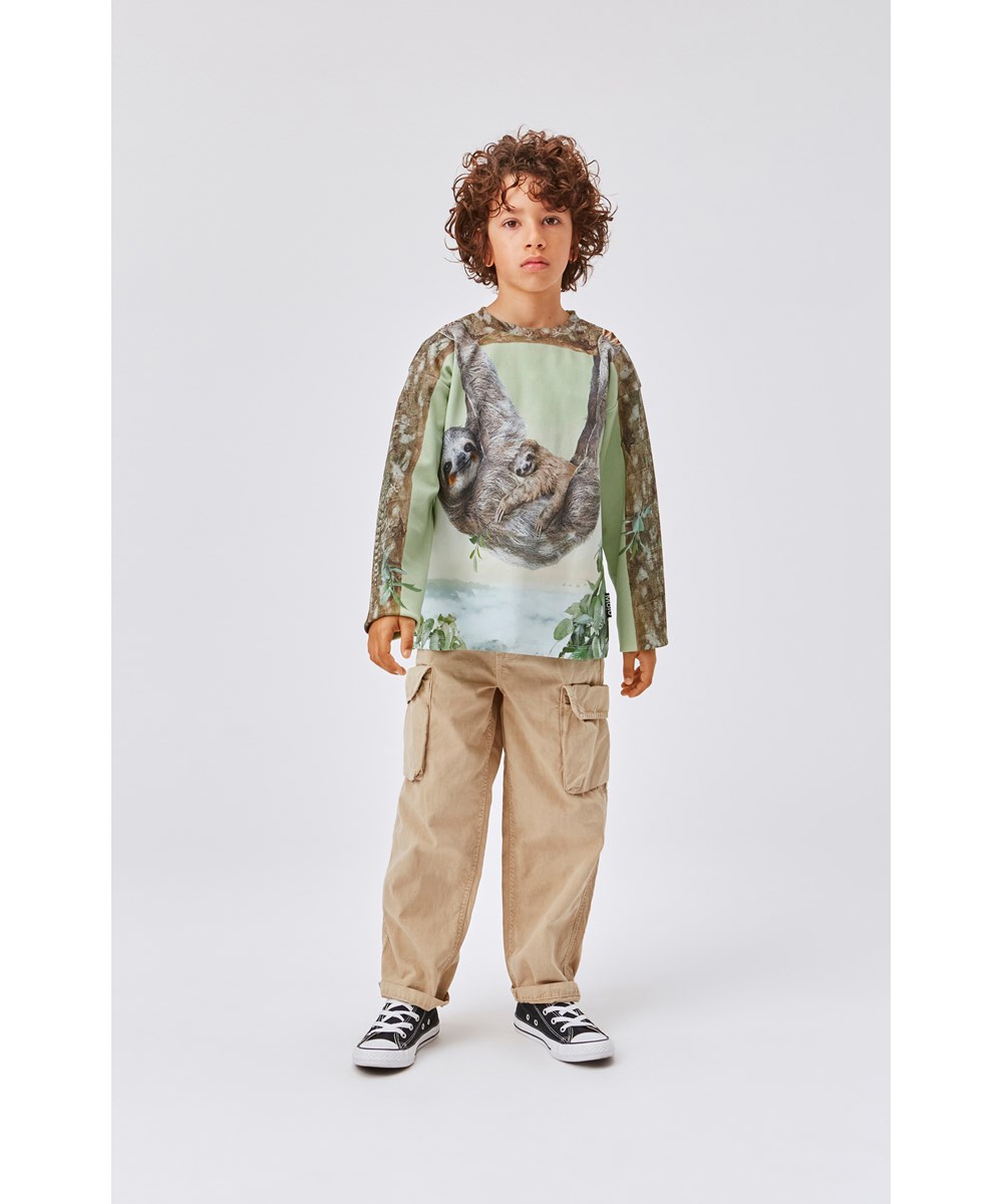 Milou - Sloth Life - Green top with sloth print