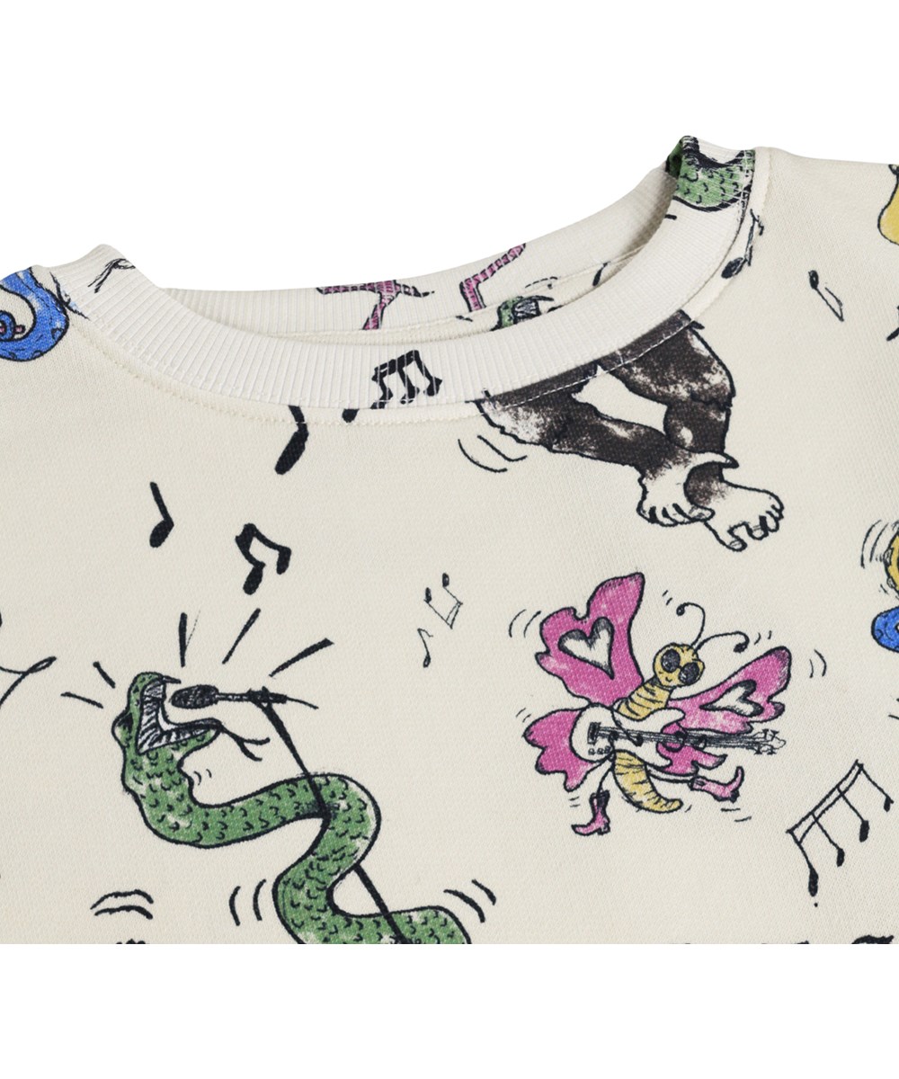 Monti - Play Together - Beige sweatshirt for children made of organic cotton with an animal print 