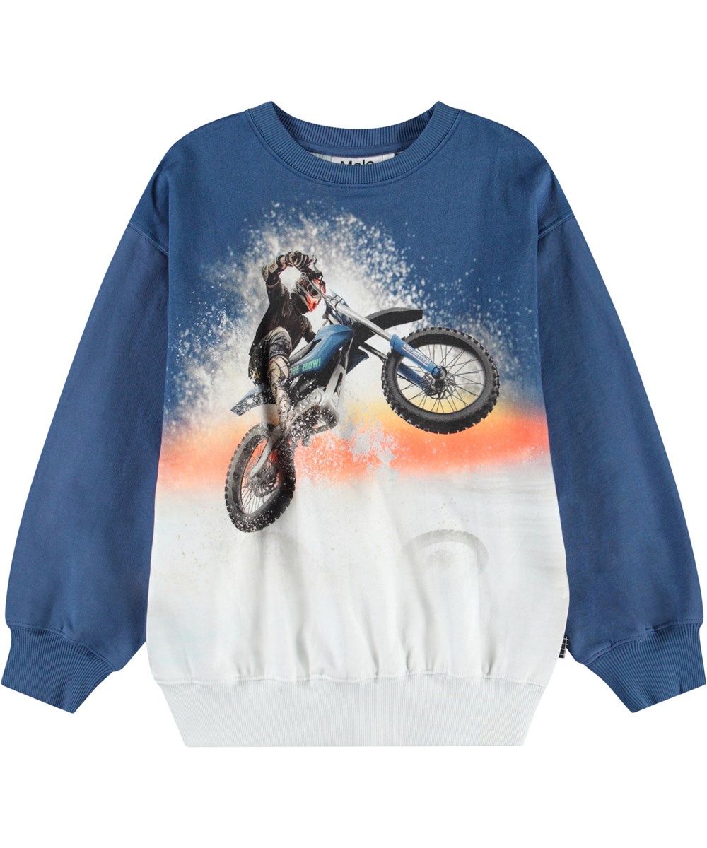 Monti - Wheelie Blue - Blue and white sweatshirt with print for children in soft, organic cotton with ribbed edges at the neck, sleeves, and bottom of the sweatshirt.