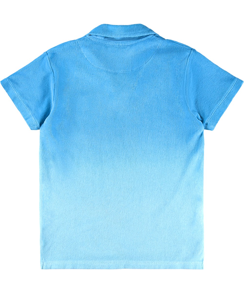 Randel - Blue Light - Blue polo T-shirt for children made of organic cotton terry with short sleeves and collar.