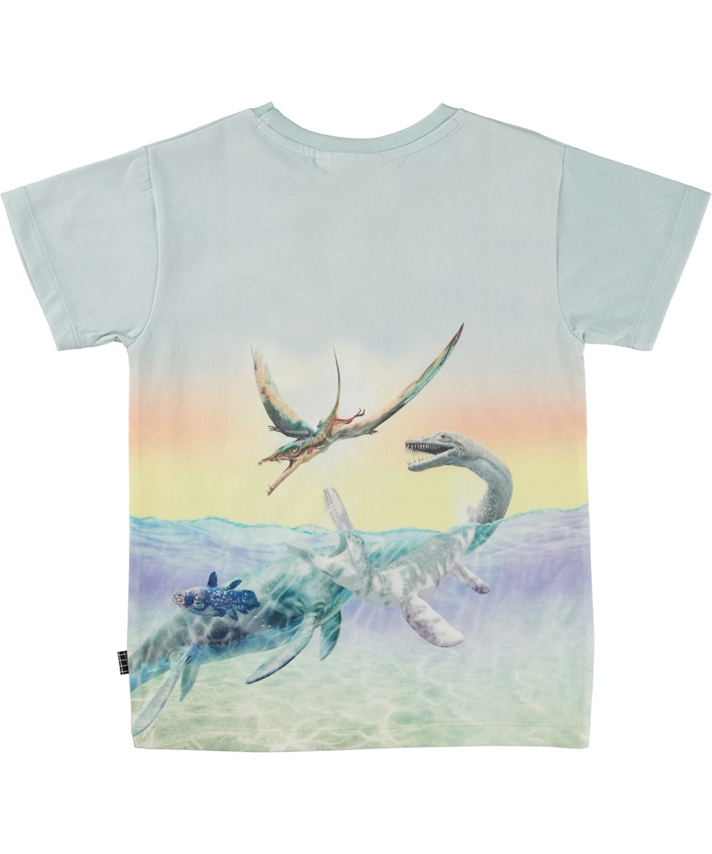 Raul - Ancient Island - Light blue t-shirt in organic cotton with a colourful dinosaur print 