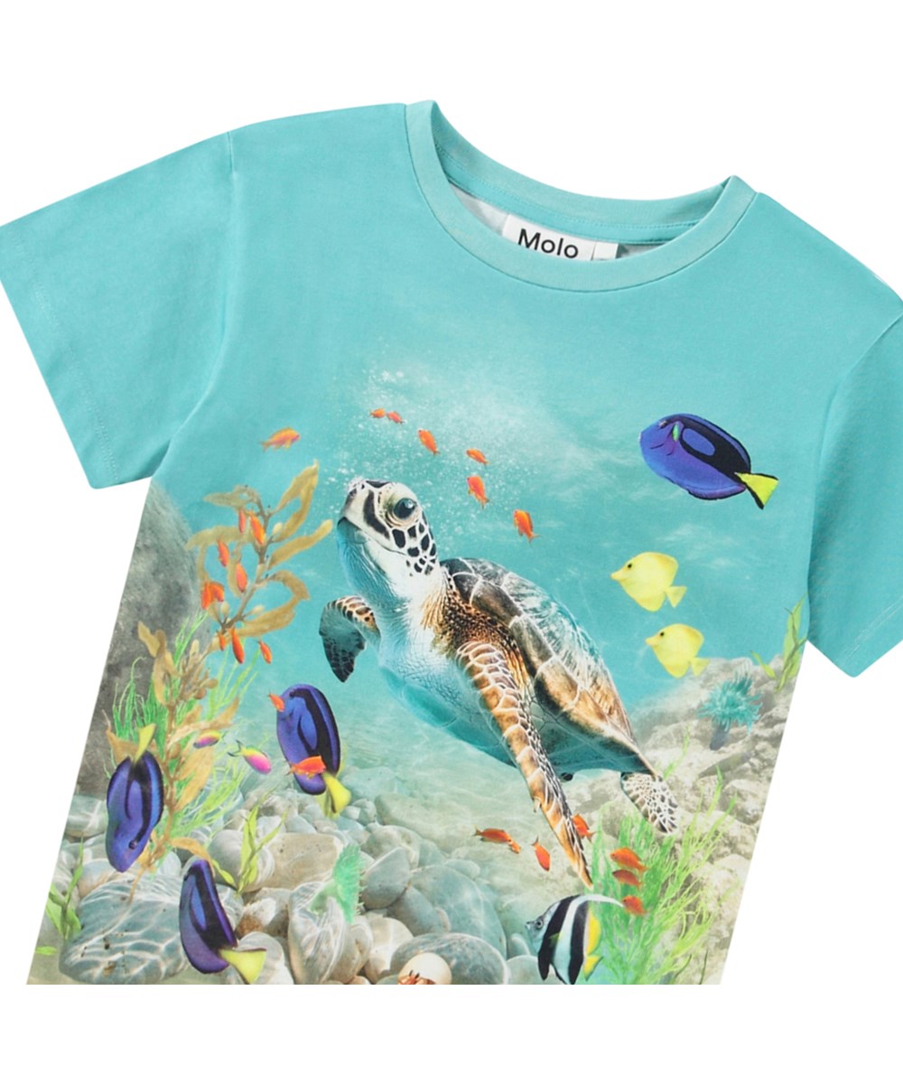 Raul - Happy Ocean - Turquoise T-shirt for children in organic cotton with short sleeves and ribbed neckline.