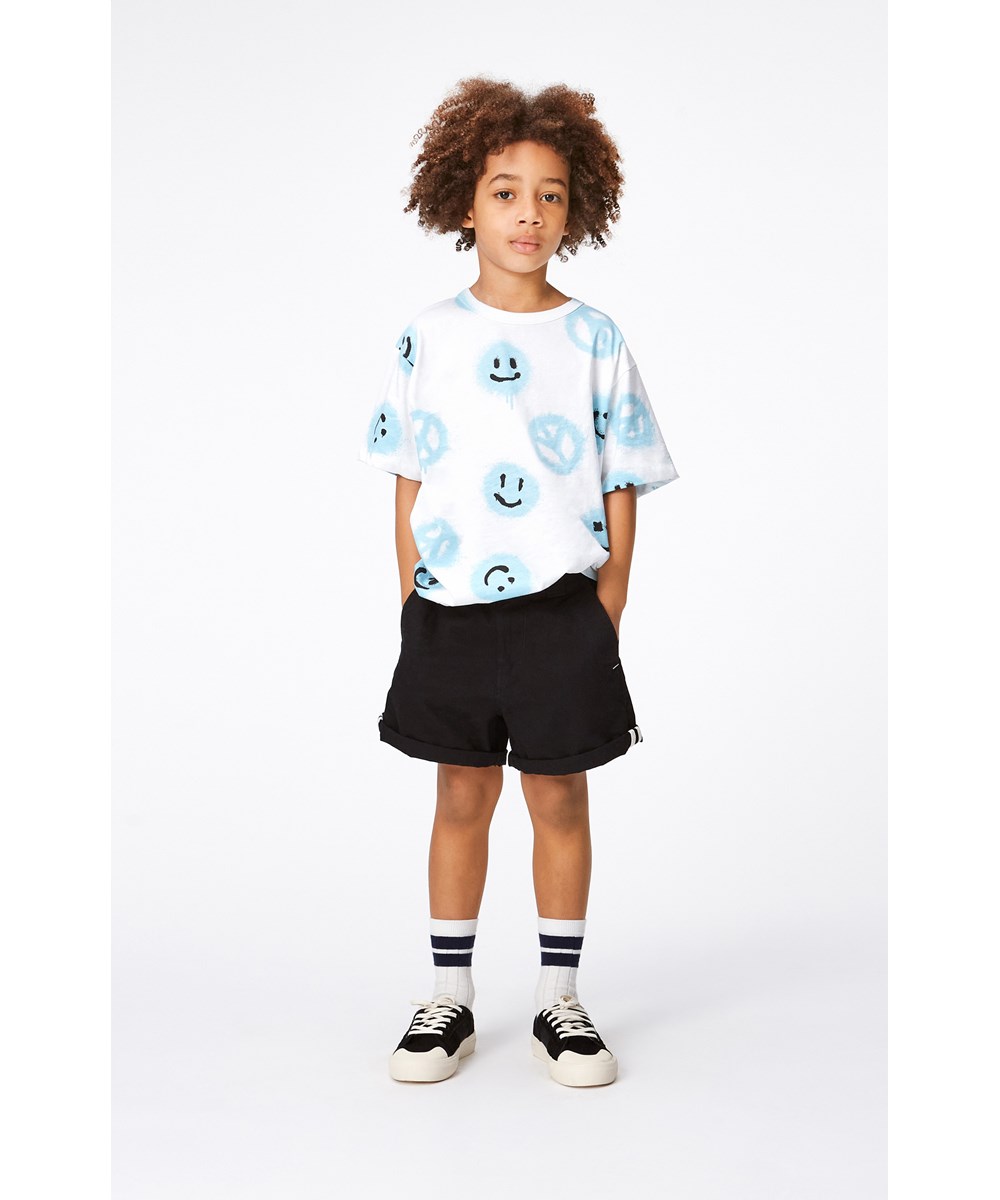 Riley - Easy Peacy Pool - White, organic t-shirt in all over print with smiling faces and peace sign