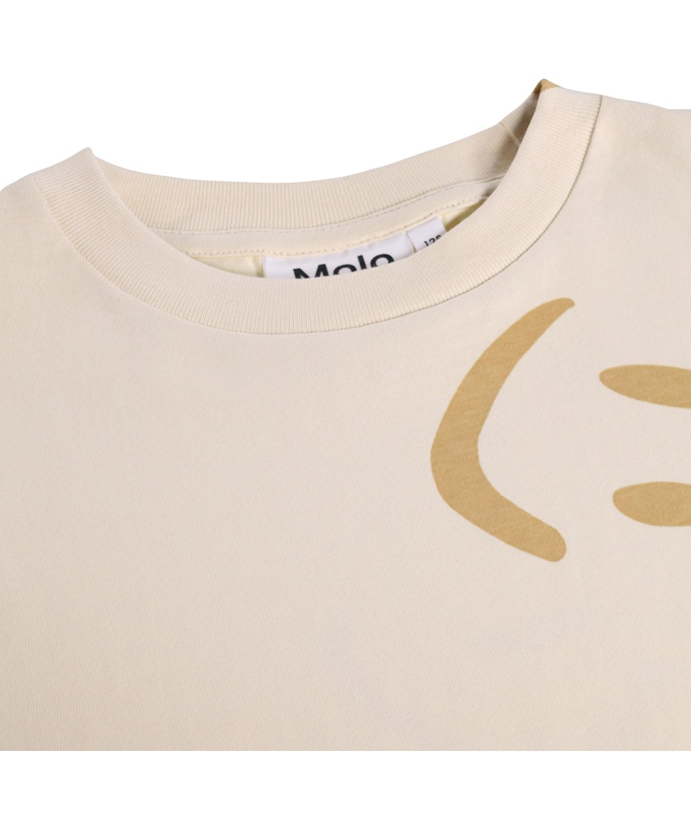 Riley - Sand Smiles - Beige T-shirt for children made of organic cotton 
