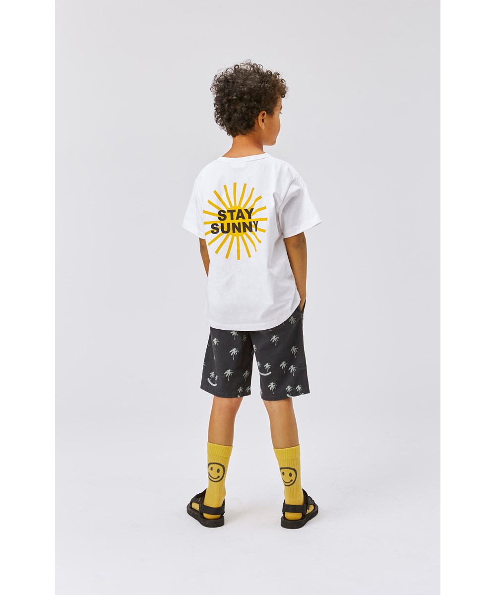 Riley - Staying Sunny - White organic t-shirt with sun print