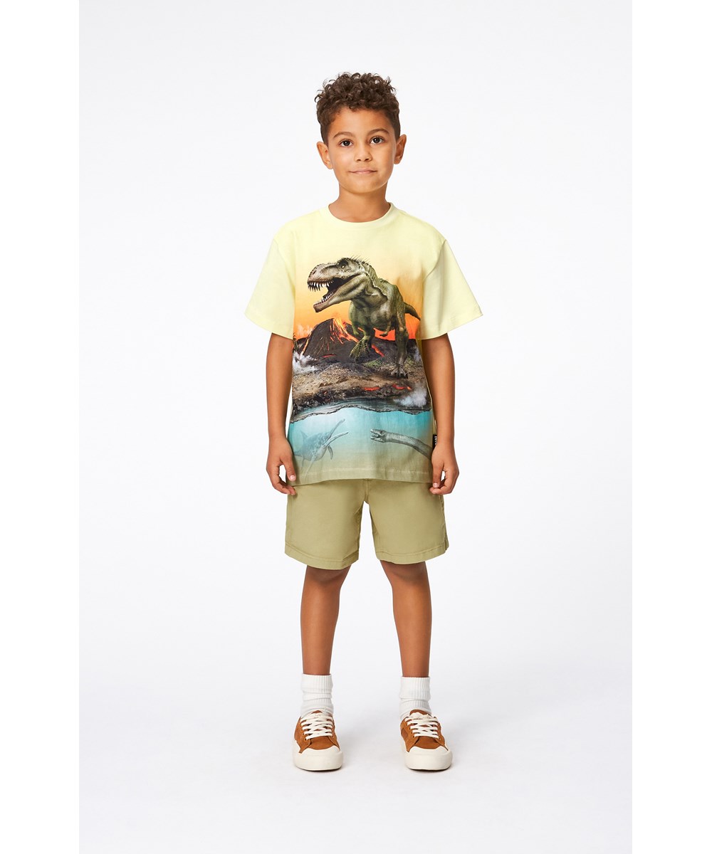 Riley - Volcano Dino - Yellow, organic t-shirt with placement dinosaur print