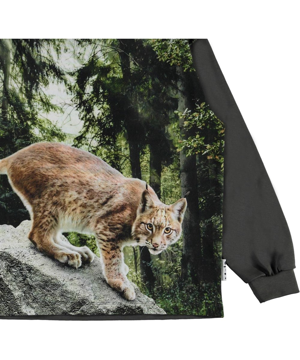 Rin - Lynx - Green organic top with a print of a cat 