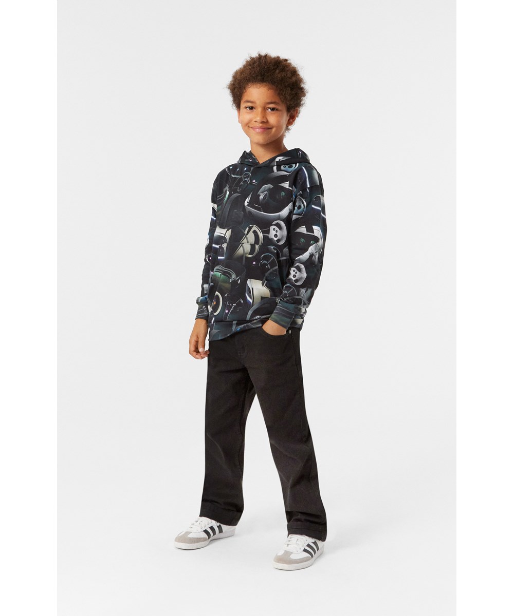 Romo - Virtual Reality - Black organic cotton hoodie with VR-inspired all-over print.