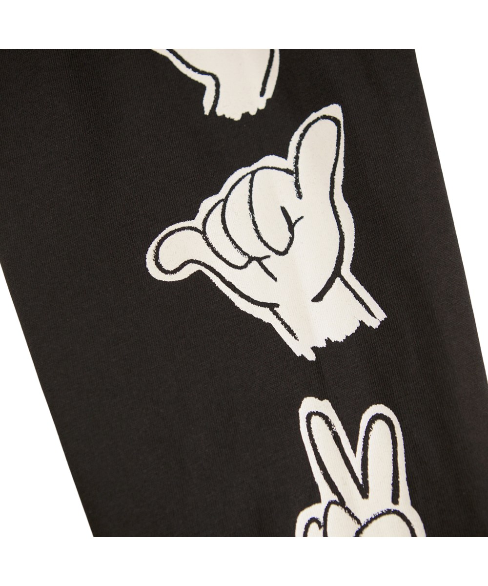Rube - By Hands - Black, long-sleeved top for children made of organic cotton with a ribbed neckline and sleeves with a print of cute and funny hand signs.