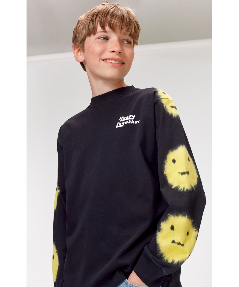Rube - Faces Tie Dye - Black sweatshirt with yellow tie dye smileys