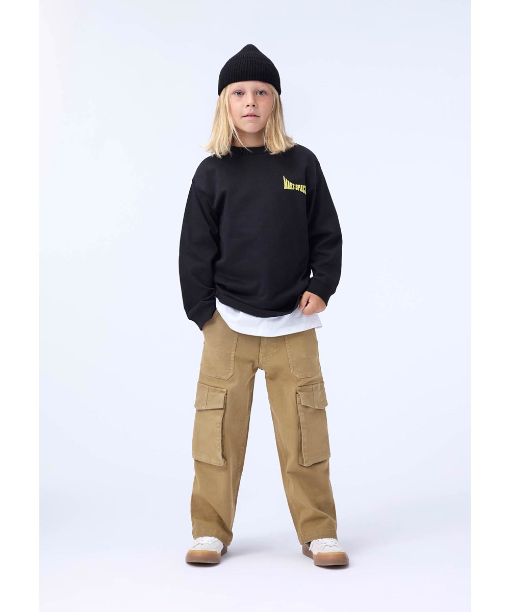 Rube - Make Space Moon - Black, long-sleeved top for children made of organic cotton with a ribbed neckline and sleeves and a yellow rubber moon print on the back.