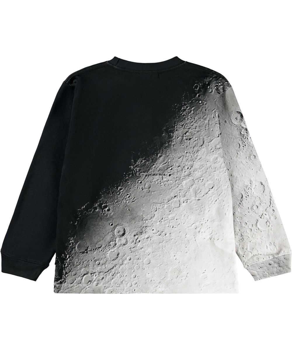 Rube - Moon Fade - Black, grey, and beige long-sleeved top for children made of organic cotton with a ribbed neckline and a print of the moon''s raw structure.
