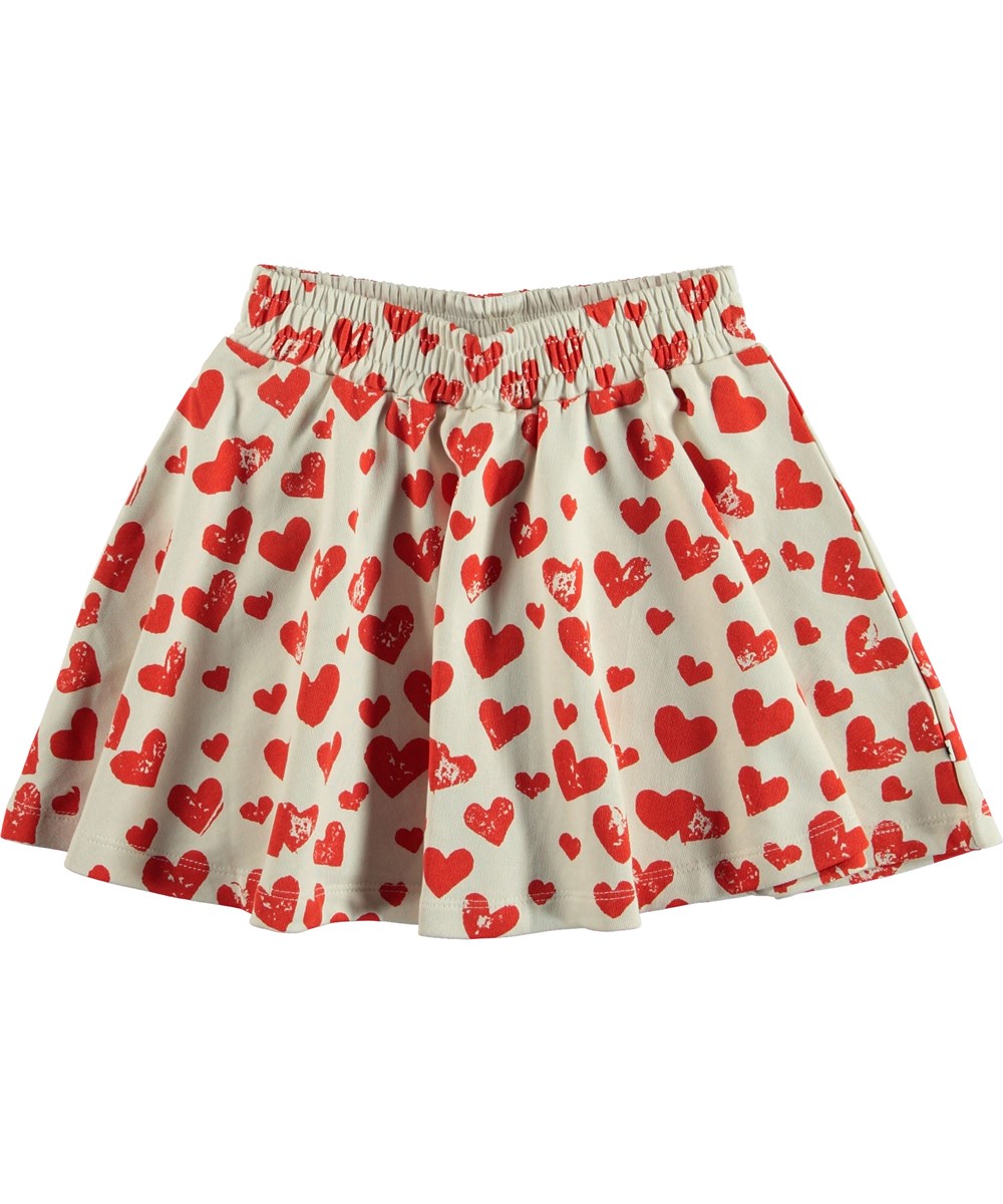 Barbera - All Is Love - Witte rok met rode hartjes.