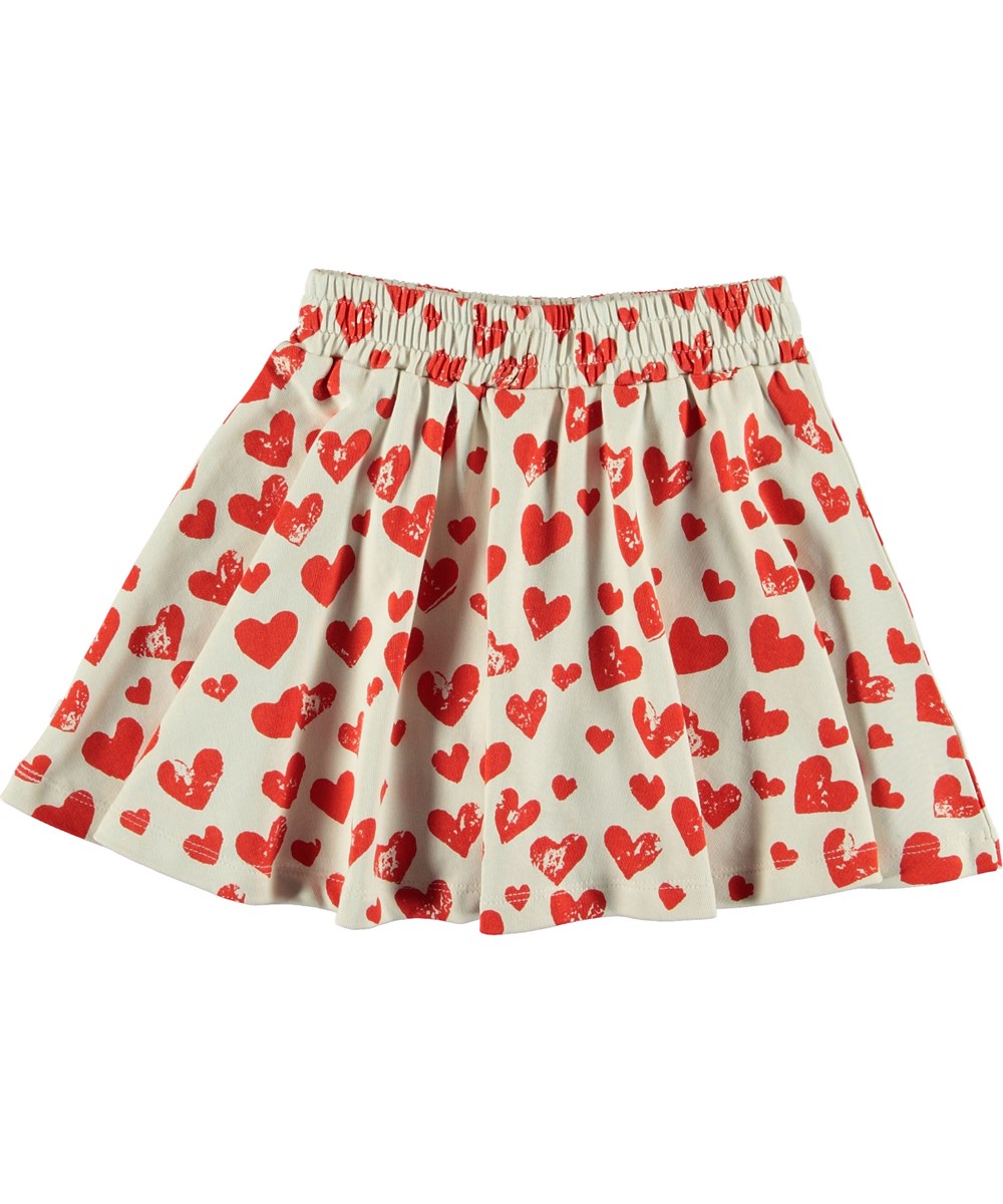 Barbera - All Is Love - Witte rok met rode hartjes.