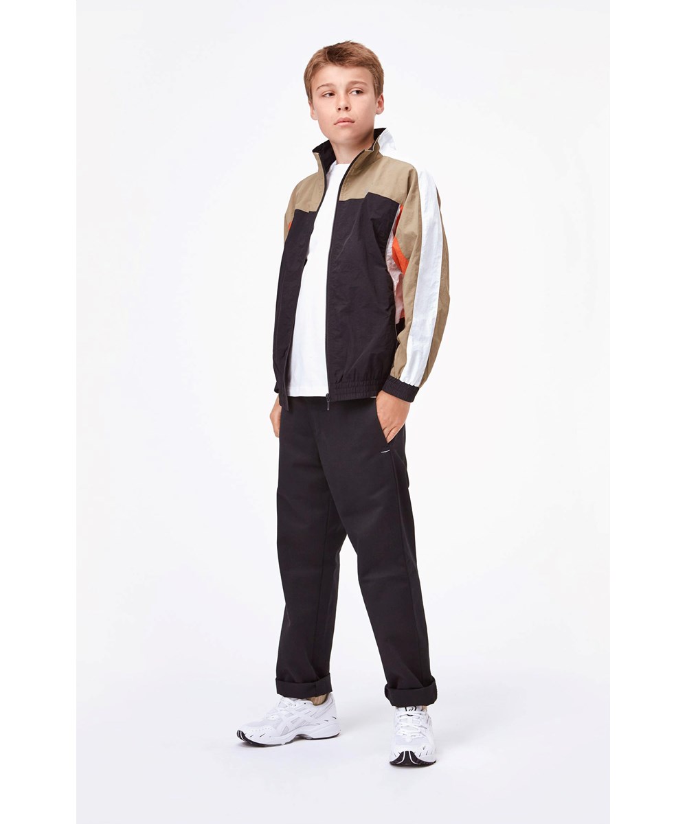 Molton - Black - Beige og sort sportsjakke med hvid 