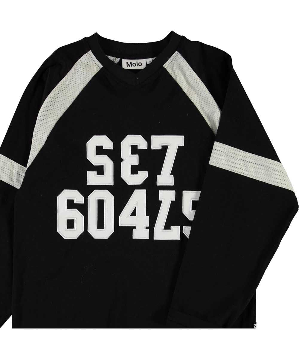 Reimar - Black - Sort bluse med hvidt net