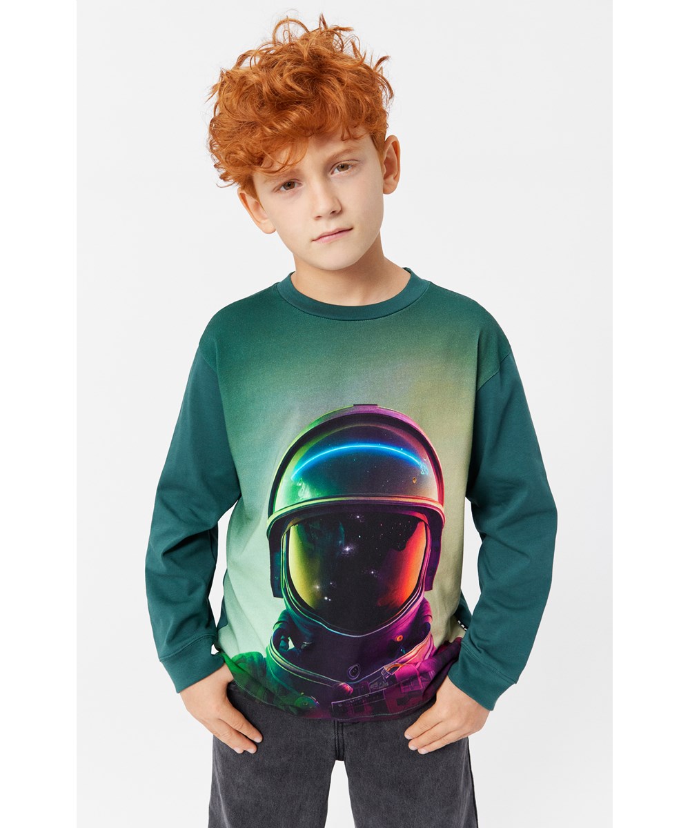 Rube - Space Helmet - Mørkegrøn langærmet bluse i økologisk bomuld med astronaut print