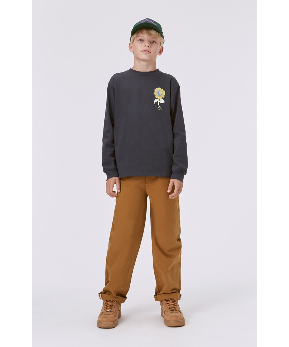 Rube - Under The Sun - Sort økologisk langærmet t-shirt med solsikkeprint