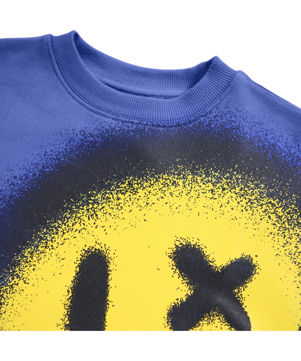 Mar - Drip Smile - Blå sweatshirt i blødt økologisk bomuld til børn med print af gult smil