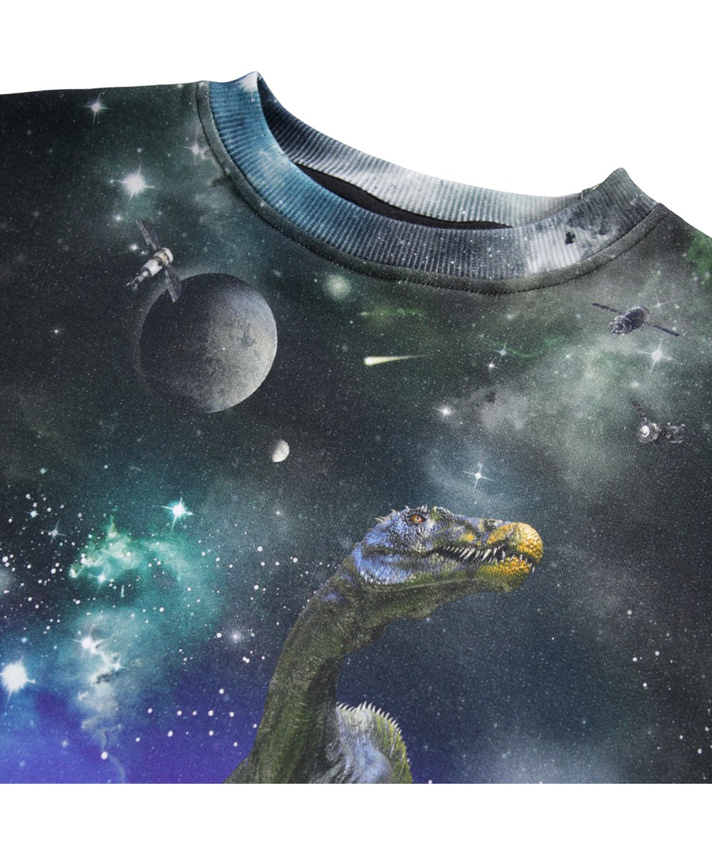 Mattis - Dino Drama - Mørk sweatshirt til børn i blødt økologisk bomuld med print af dinosaur og flot himmel. 