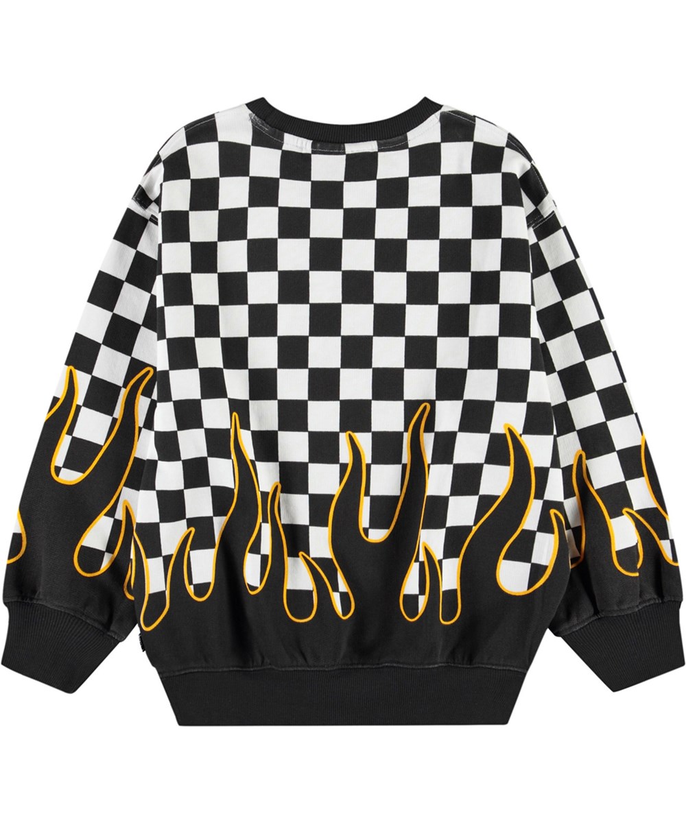 Monti - Check On Fire - Sort og hvidternet flammebluse sweatshirt med print til børn i blødt, økologisk bomuld med ribkanter ved hals, ærmer og i bunden af blusen.