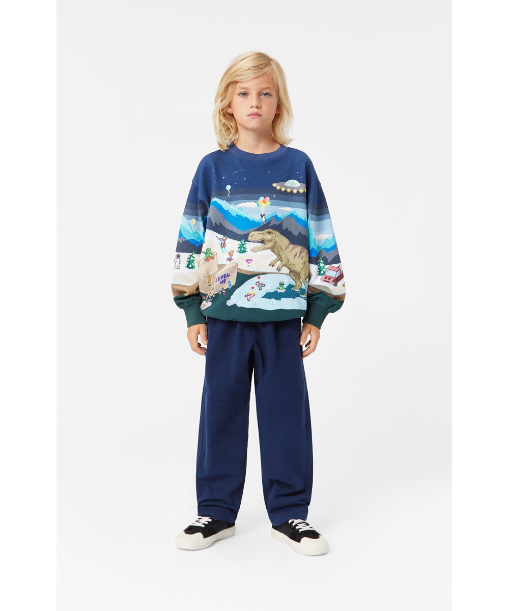 Monti - Pixelscape - Multifarvet økologisk sweatshirt med alloverold school arkade print