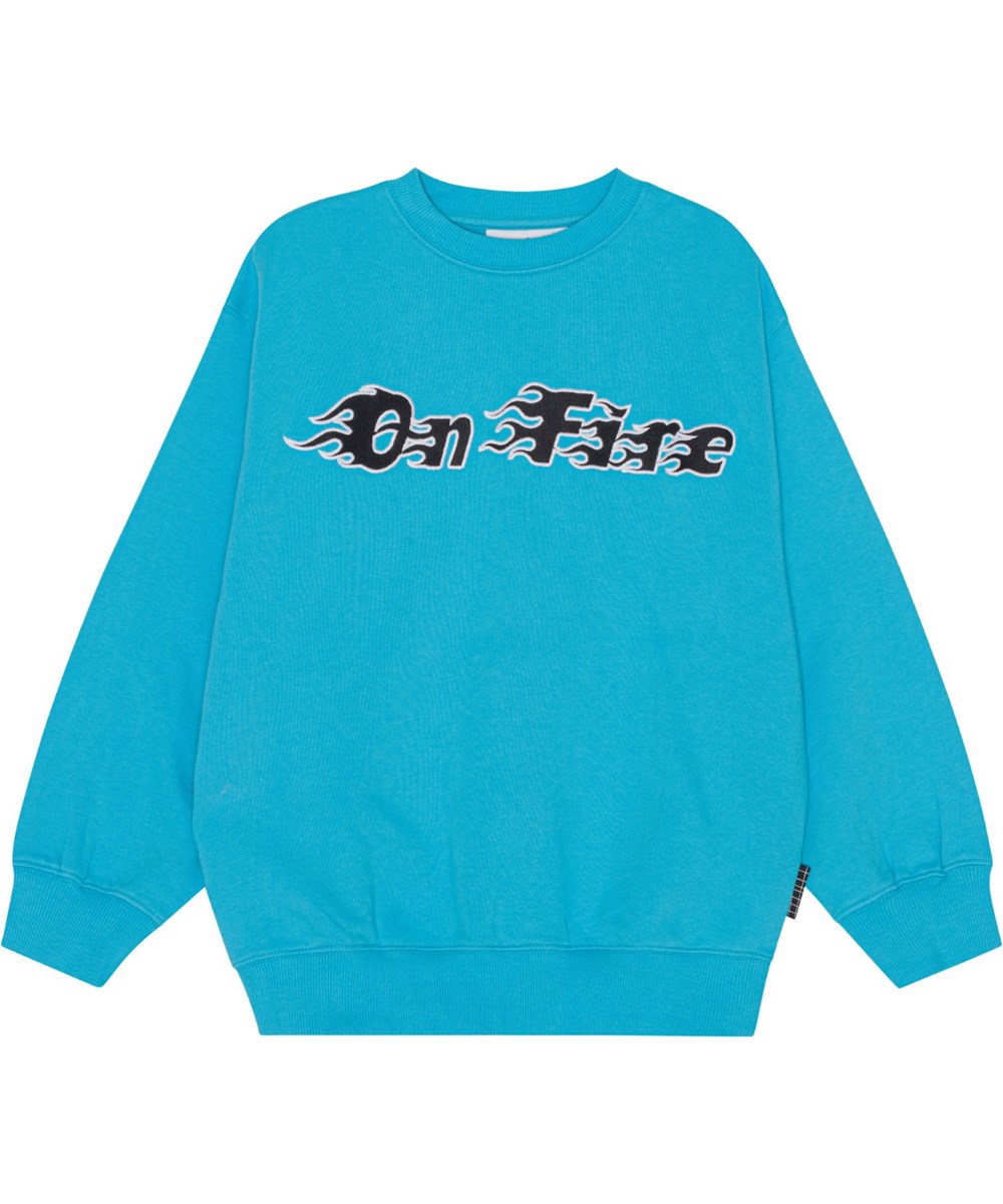 Monti - Turquoise Blue - Turkis økologisk sweatshirt med placeret on fire broderi