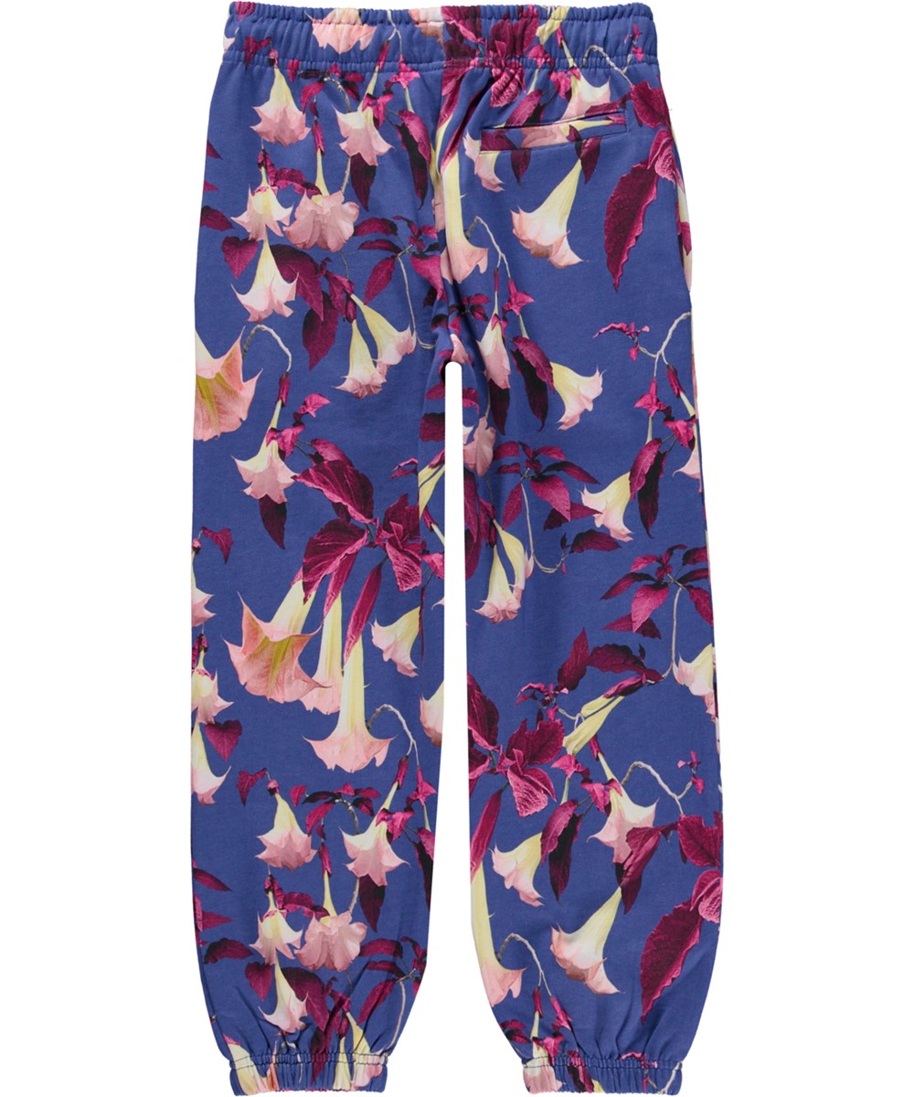 Adan - Angels Trumpets - Blå ekologiska joggingbyxor med blommigt mönster.