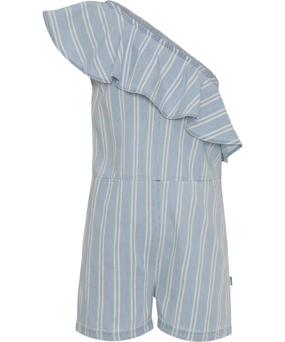 Amira - Striped Chambrey - Ljusblå asymmetrisk byxdräkt med vita ränder.