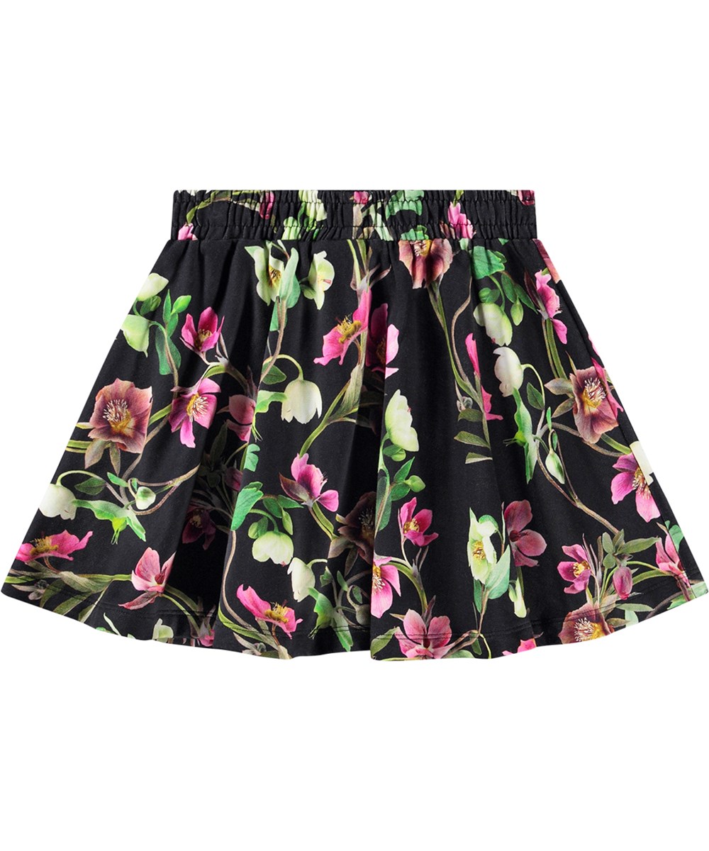 Barbera - Hellebore Black - Svart kjol i ekologisk bomull med gummiband i midjan och blommigt mönster.