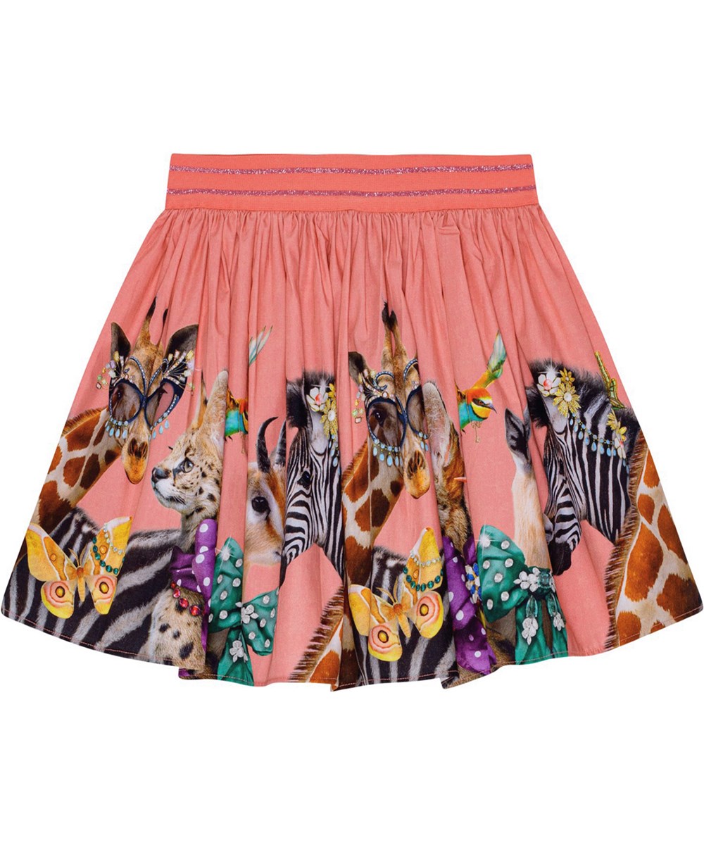 Brenda - Dressed Up - Korallfärgad kjol i ekologisk bomull med festligt djurtryck.