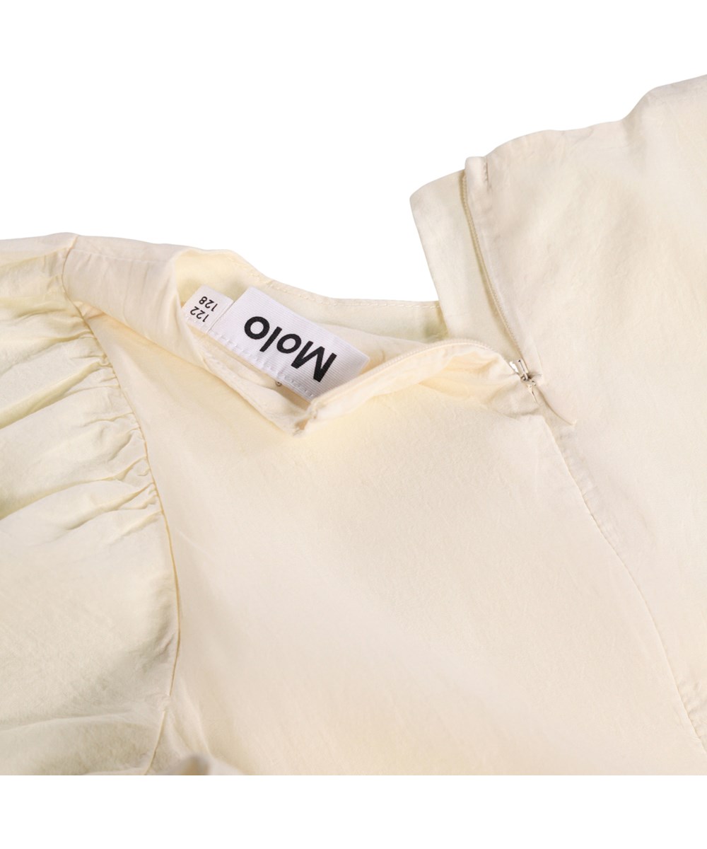 Caya - Pearled Ivory - Off-white klänning för barn i ekologisk bomull med broderie anglaise