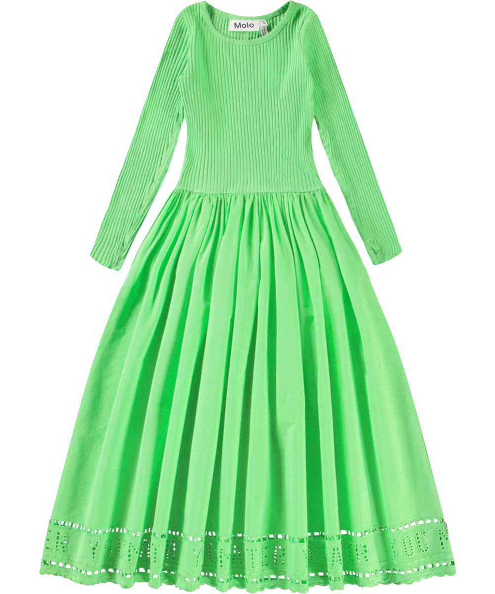 Cibelle - Green Vibes - Långärmad grön klänning för barn i ekologisk bomull med en tät ribbad jerseytopp, rund hals och en volyminös helcirkelskjol i bomullspoplin.