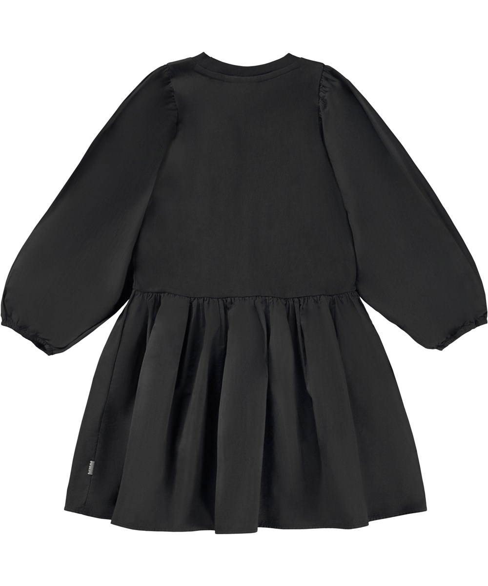 Cosette - Black - Svart knälång ekologisk klänning med poplinärmar och kjol.