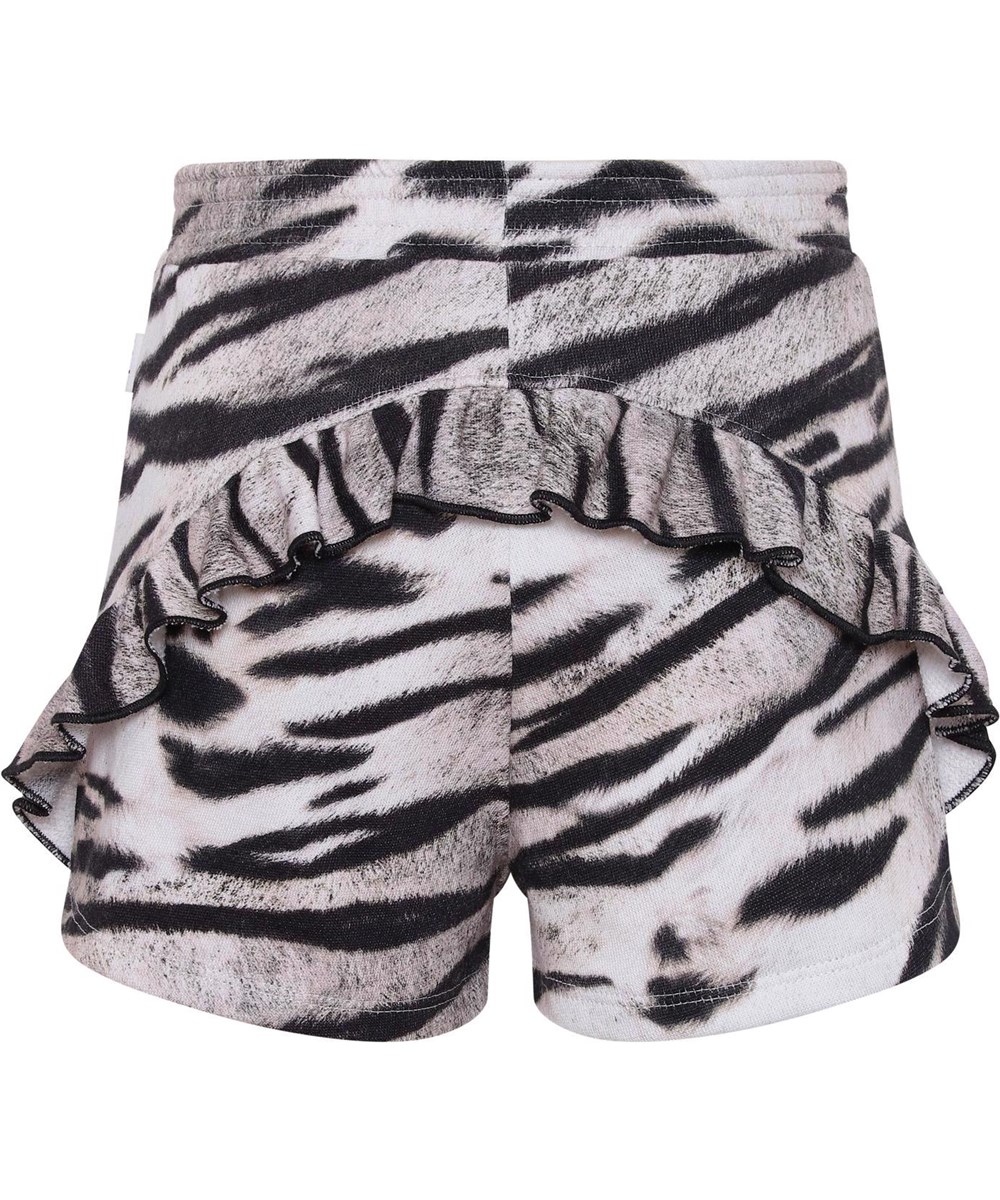 Amma - Tiger White - Ekologiska shorts med svart och vitt tigermönster.