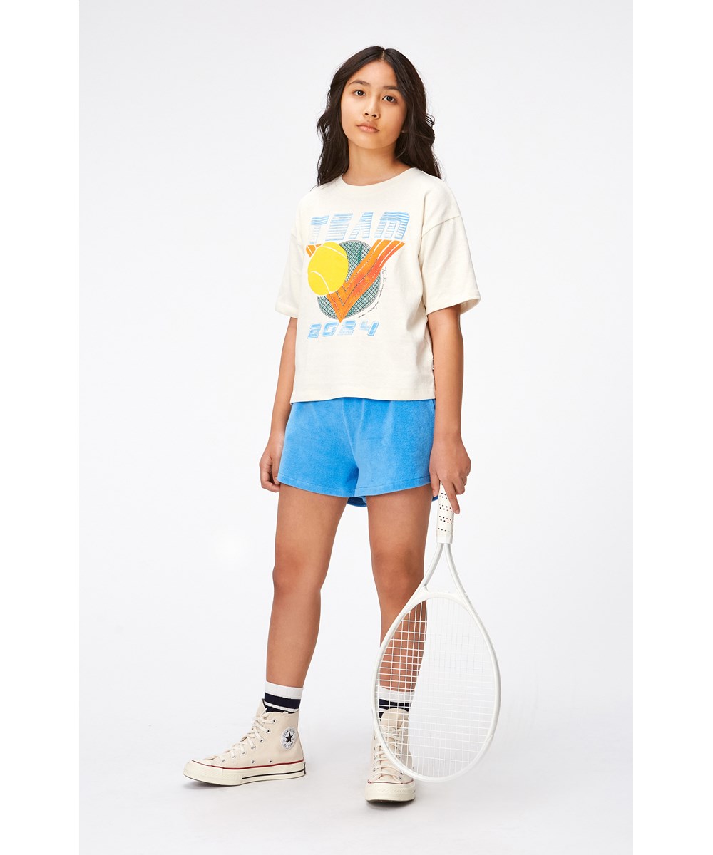 Angel - Forget Me Not - Blå sportiga nylonshorts med klöver logga.