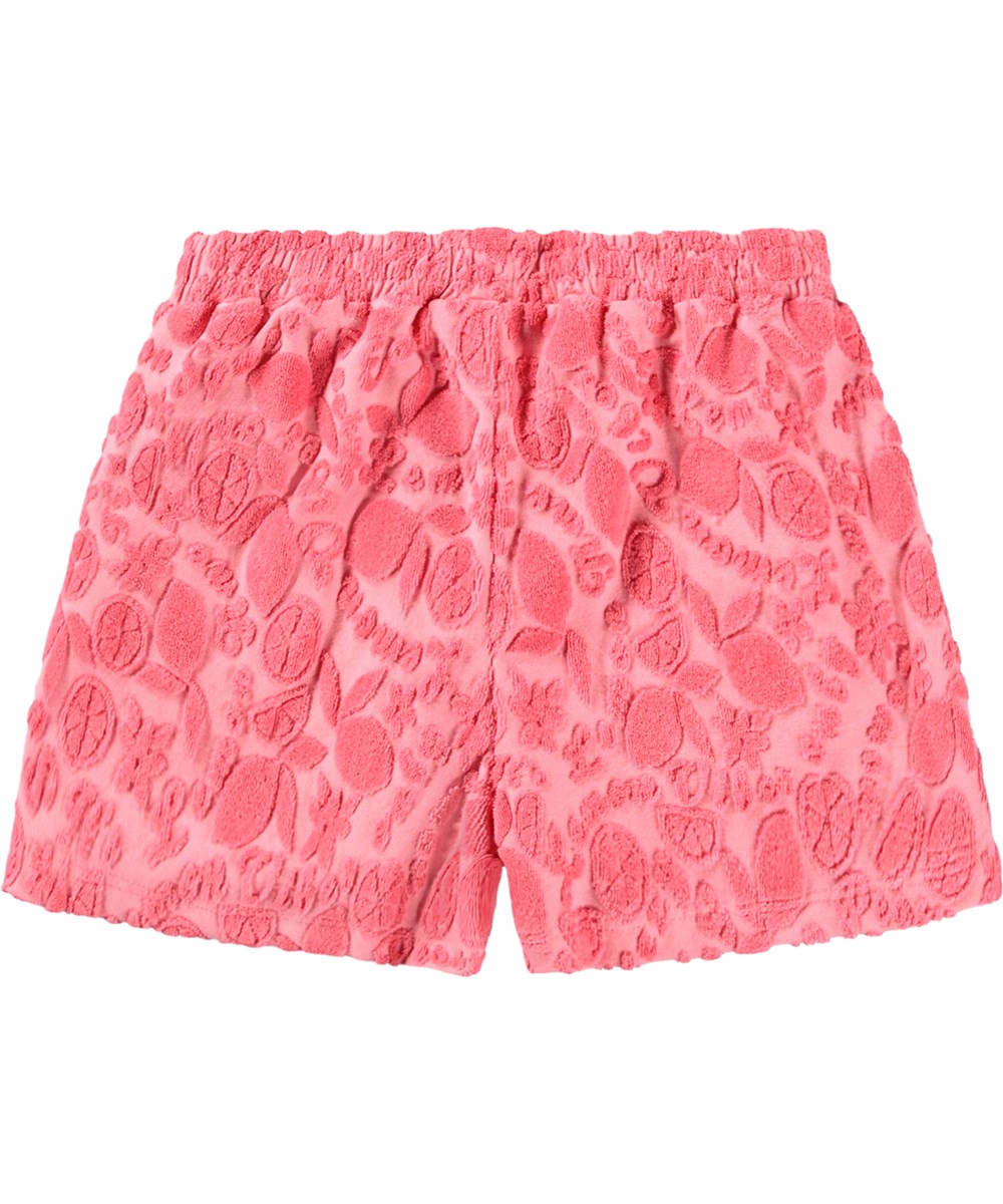 Angela - Lemon Quotes - Rosa shorts för barn med ett mönster av citrusfrukter i bomullsfrotté.