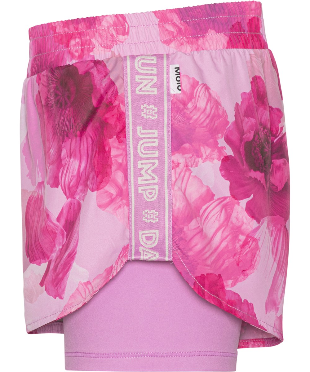Omari - Dreamy Poppies - Tvådelade sportshorts med rosa blommor.