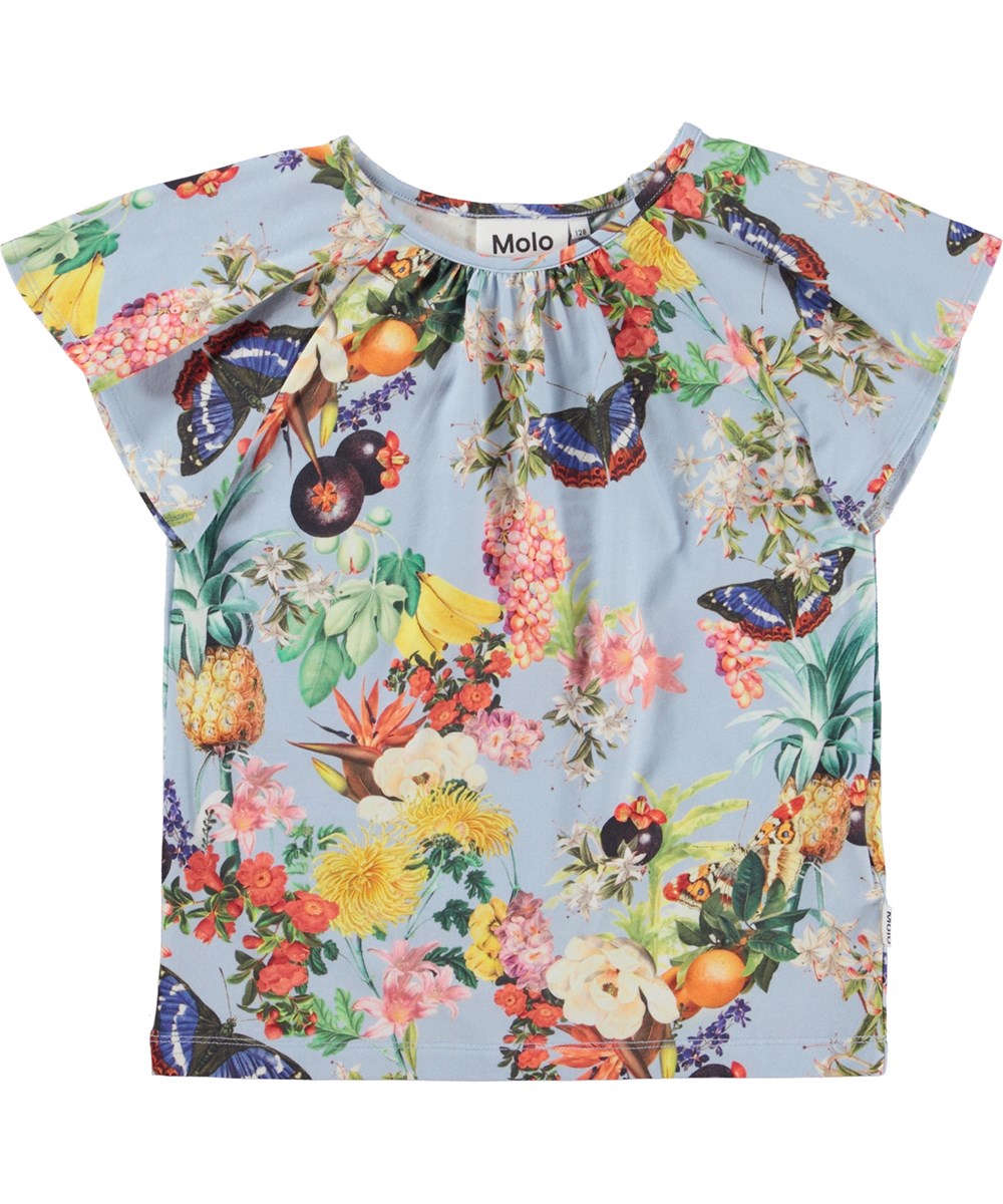Rachel - Tropical Fruits - Ekologisk topp med svävande ärmar och tropiska blommor.