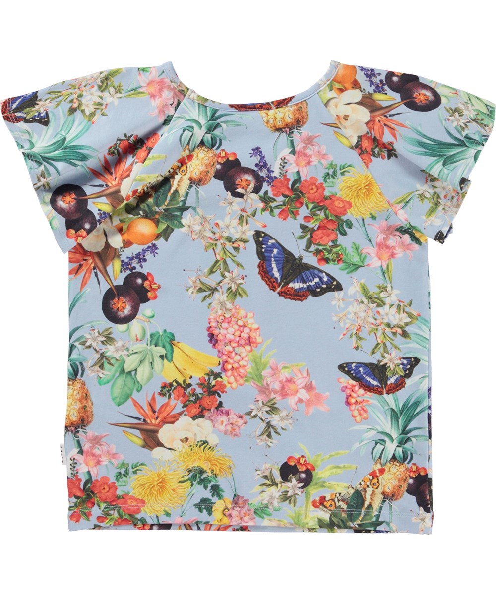 Rachel - Tropical Fruits - Ekologisk topp med svävande ärmar och tropiska blommor.