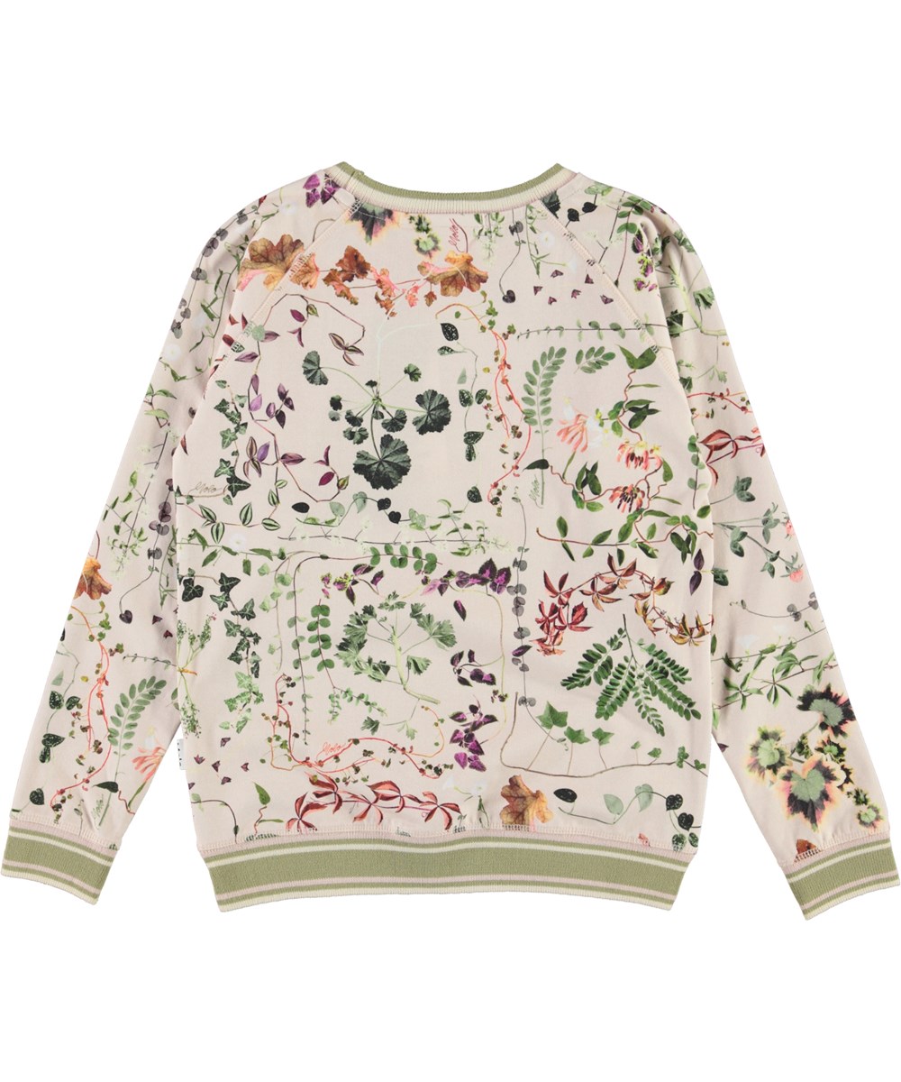 Raewyn - Herbarium - Ekologisk rosa tröja med blommor.