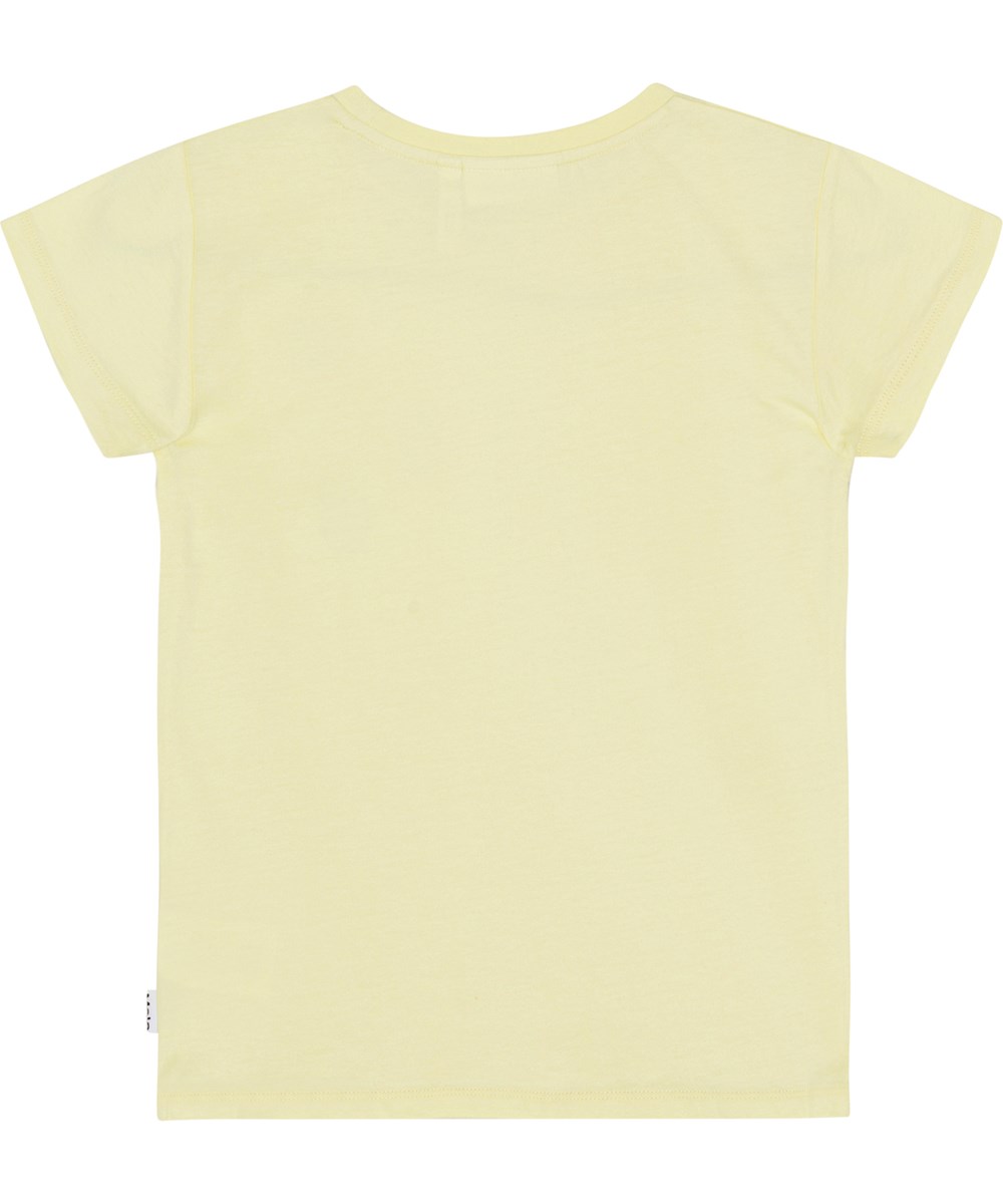 Ranva - Pale Dawn - Pastell gul kortärmad T-shirt i ekologisk bomull med tre paljettsmileys. 